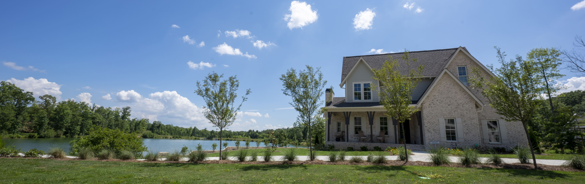 House next to lake large image